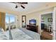 King bedroom with ocean view, TV and access to balcony at 12000 Gulf Blvd # 501-W, Treasure Island, FL 33706