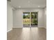 Bright Gathering room with sliding glass doors leading to the backyard at 20363 Symphony Pl, Venice, FL 34293
