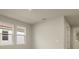 Bright and airy interior with neutral walls and tile flooring at 20363 Symphony Pl, Venice, FL 34293
