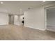 Open living room with kitchen island and tile floors at 20363 Symphony Pl, Venice, FL 34293