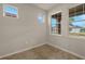 Bright study with multiple windows and tile flooring at 20363 Symphony Pl, Venice, FL 34293