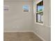 Bright study with multiple windows and tile flooring at 20363 Symphony Pl, Venice, FL 34293
