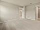 Bright bedroom with carpet and access to another room at 20375 Symphony Pl, Venice, FL 34293