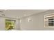 Bright living room with sliding glass doors leading to backyard at 20375 Symphony Pl, Venice, FL 34293