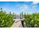 Private dock with boat lift and access to the water at 6613 Seabird Way, Apollo Beach, FL 33572