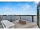 Relaxing waterfront dock with bench overlooking the water at 6613 Seabird Way, Apollo Beach, FL 33572