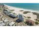 Aerial view showing building's location near beach and highway at 11000 Gulf Blvd # 703, Treasure Island, FL 33706