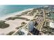 Aerial view of beachfront property, showing building and beach at 11000 Gulf Blvd # 703, Treasure Island, FL 33706