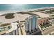 Aerial view of beachfront highrise building and surrounding area at 11000 Gulf Blvd # 703, Treasure Island, FL 33706