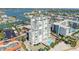 Aerial view showing building, pool, and beach at 11000 Gulf Blvd # 703, Treasure Island, FL 33706