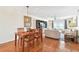 Bright dining area with wood floors and ocean view at 11000 Gulf Blvd # 703, Treasure Island, FL 33706
