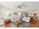 Open living room with hardwood floors and ocean view at 11000 Gulf Blvd # 703, Treasure Island, FL 33706