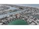 Aerial view of home and canal setting at 411 Belle Isle Ave, Belleair Beach, FL 33786