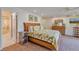 Main bedroom with ensuite bathroom and walk-in closet at 411 Belle Isle Ave, Belleair Beach, FL 33786