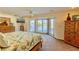 Main bedroom with water views, walk-in closet and ensuite bathroom at 411 Belle Isle Ave, Belleair Beach, FL 33786