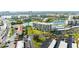 Aerial view of waterfront community with buildings, parking, and landscaping at 7400 Sun Island Dr # 501, South Pasadena, FL 33707