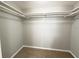 Large walk-in closet with double hanging rods at 7400 Sun Island Dr # 501, South Pasadena, FL 33707