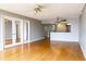 Living room, hardwood floors, kitchen access and mirrored doors at 7400 Sun Island Dr # 501, South Pasadena, FL 33707