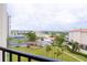 Panoramic view of city streets and green spaces from balcony at 7400 Sun Island Dr # 501, South Pasadena, FL 33707