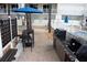 Community grilling area with chairs and tables at 20002 Gulf Blvd # 2604, Indian Shores, FL 33785
