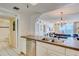 The kitchen has stainless appliances and a granite countertop at 20002 Gulf Blvd # 2604, Indian Shores, FL 33785