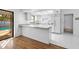 Bright kitchen overlooking the pool at 2233 Curlew Rd, Dunedin, FL 34698
