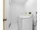 Laundry area with white appliances and tile floor at 2233 Curlew Rd, Dunedin, FL 34698