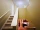 Indoor staircase leading to the upper level of the home at 32111 Brookstone Dr, Wesley Chapel, FL 33545