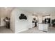 Modern kitchen with white cabinets, black appliances, and island at 3873 Gainer Spring Avenue, New Port Richey, FL 34653