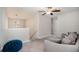 Bright loft features a sofa and offers extra living space at 3873 Gainer Spring Avenue, New Port Richey, FL 34653