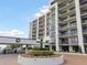Luxury condo building with landscaped grounds at 4 Belleview Blvd # 801, Belleair, FL 33756