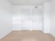 Spacious bedroom featuring built-in shelving and two closets at 4770 White Sanderling Ct, Tampa, FL 33619