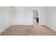 Spacious bedroom with plush carpeting and an ensuite bathroom at 4770 White Sanderling Ct, Tampa, FL 33619