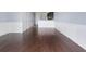 Spacious living room with hardwood floors and lots of natural light at 4770 White Sanderling Ct, Tampa, FL 33619