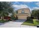 Charming two-story home with a two-car garage, driveway, and a well-maintained lawn and garden at 9703 33Rd E Ave, Palmetto, FL 34221