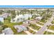 Aerial view of the neighborhood showcasing a beautiful lake at 2460 Terry Ln, Sarasota, FL 34231