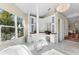 Luxurious Primary bathroom with marble flooring and a large soaking tub at 3025 Oakmont Dr, Clearwater, FL 33761
