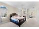 Spacious main bedroom with fireplace and sitting area at 3025 Oakmont Dr, Clearwater, FL 33761