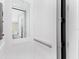 Modern private elevator with glass doors and sleek design at 3025 Oakmont Dr, Clearwater, FL 33761