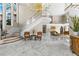 Elegant foyer with marble floors, staircase, and chandelier at 3025 Oakmont Dr, Clearwater, FL 33761