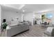 Open living area with modern kitchen, dining, and living spaces at 3025 Oakmont Dr, Clearwater, FL 33761