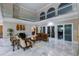 Open living space with marble floors and elegant furnishings at 3025 Oakmont Dr, Clearwater, FL 33761