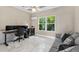 Spacious home office with built-in desk and marble flooring at 3025 Oakmont Dr, Clearwater, FL 33761