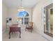 Bright home office with built-in shelving and large window overlooking the water at 3025 Oakmont Dr, Clearwater, FL 33761