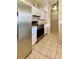 Kitchen with stainless steel appliances and white cabinets at 1001 N Park Rd, Plant City, FL 33563