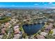 Expansive aerial view of a residential community nestled along a scenic waterfront at 1160 Darlington Oak Ne Dr, St Petersburg, FL 33703