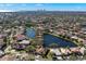 Stunning aerial view of a lakeside community with well-maintained homes and lush trees at 1160 Darlington Oak Ne Dr, St Petersburg, FL 33703
