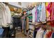 Walk-in closet with ample shelving and storage for clothes, shoes, and accessories at 1160 Darlington Oak Ne Dr, St Petersburg, FL 33703