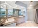 Spacious bathroom, double vanity, shower, and granite at 1420 Water View W Dr # 203, Largo, FL 33771