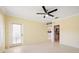 Bright bedroom with hardwood floors and access to bathroom at 1420 Water View W Dr # 203, Largo, FL 33771